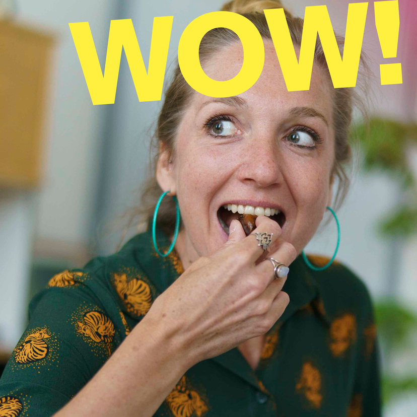 woman eats a fresh date