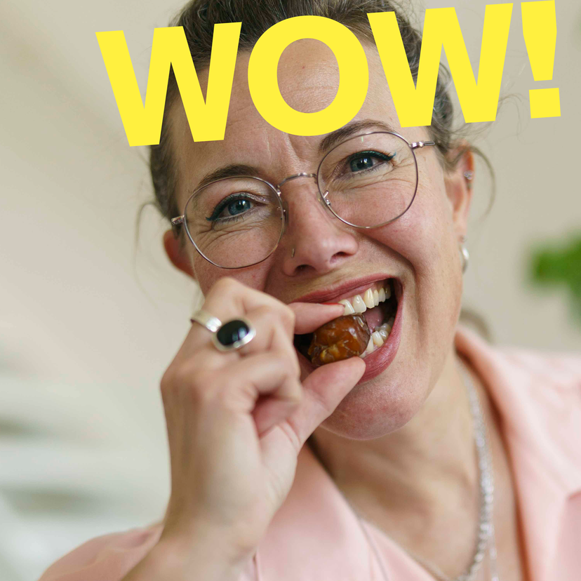 woman eats a date