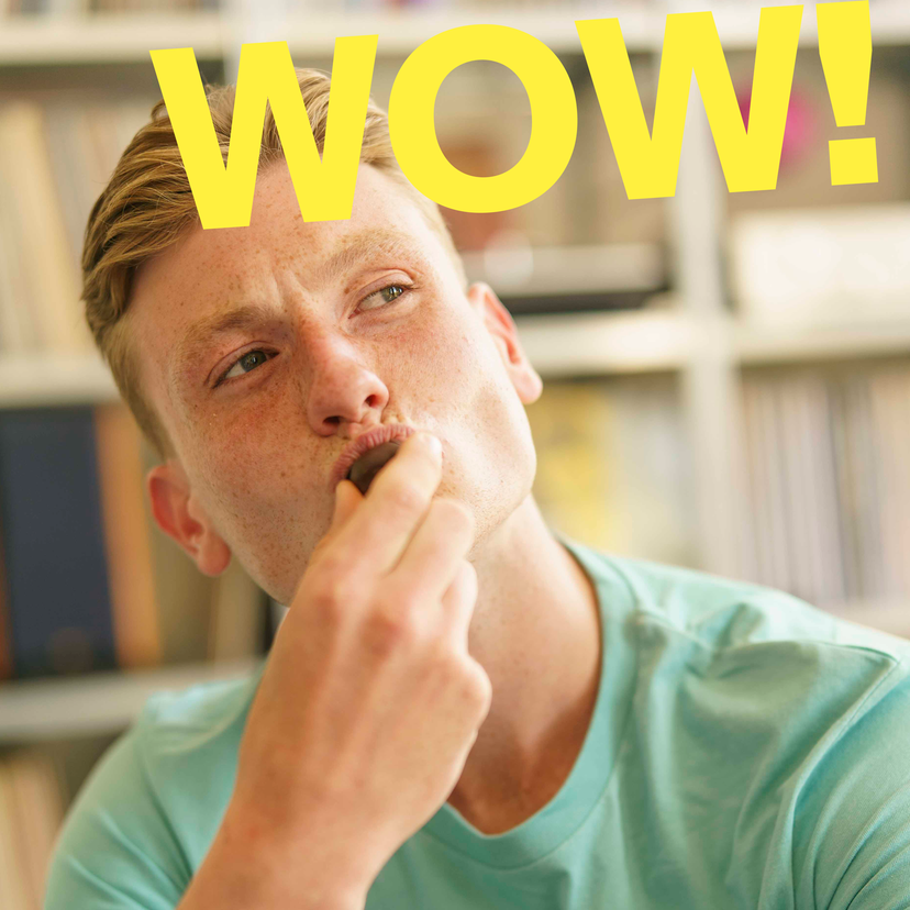 yooung man tastes a fresh date