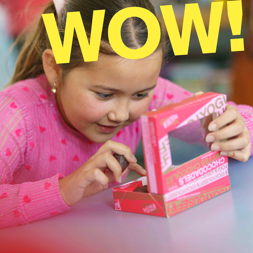 young girl eats choco dates